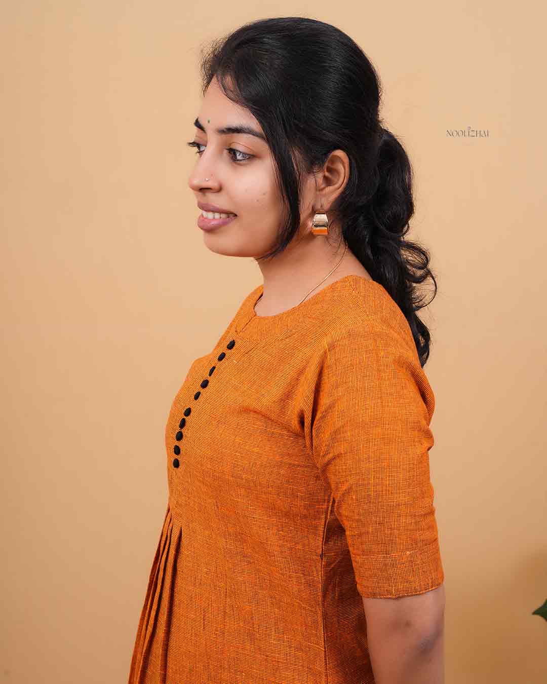 Solid Orange A-Line Kurti with Button Detail